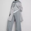 Oumbärlig trenchcoat med bälte
