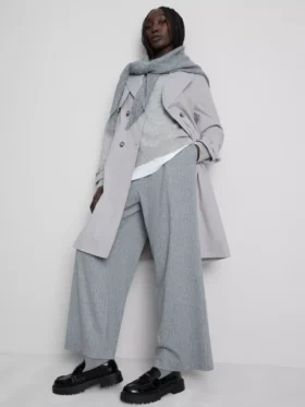 Oumbärlig trenchcoat med bälte