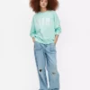 Oversized-tröja med Miami-text