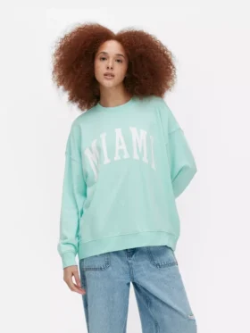 Oversized-tröja med Miami-text
