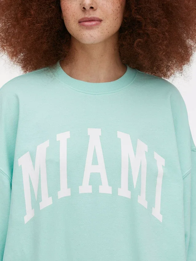 Oversized-tröja med Miami-text
