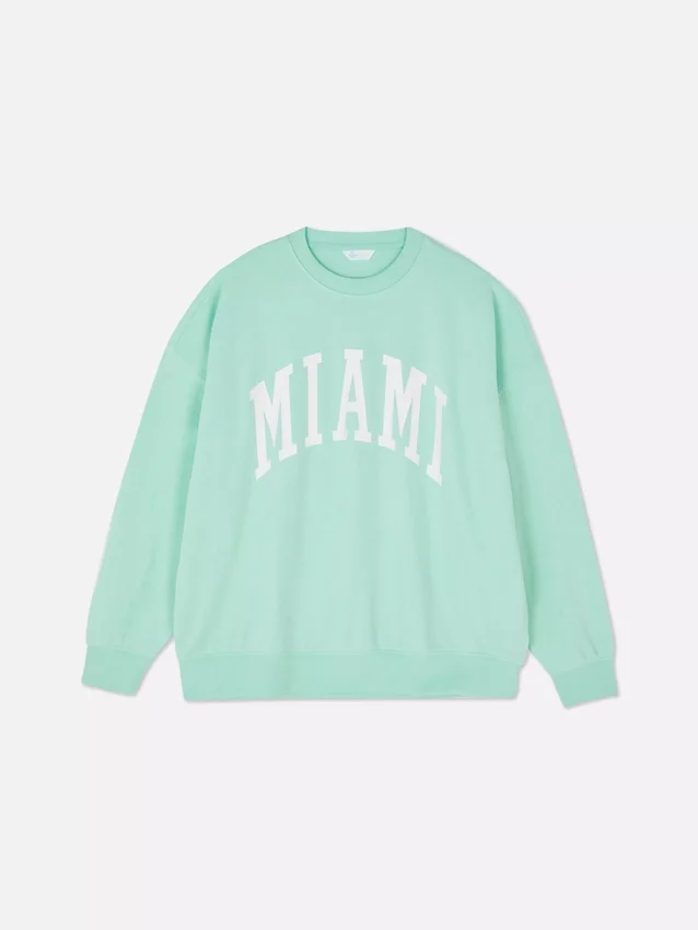 Oversized-tröja med Miami-text