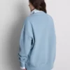 Oversized-tröja med neddragna axlar