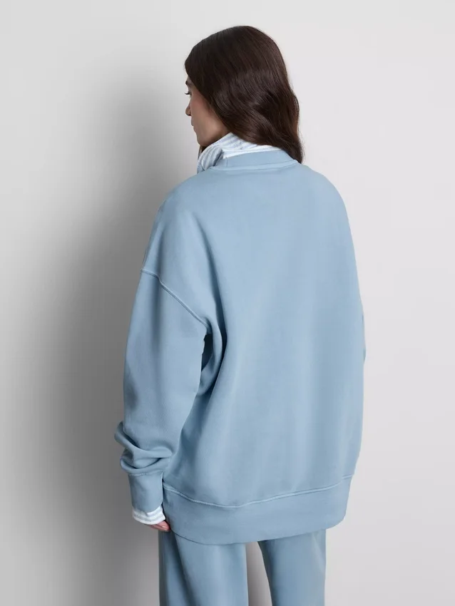 Oversized-tröja med neddragna axlar
