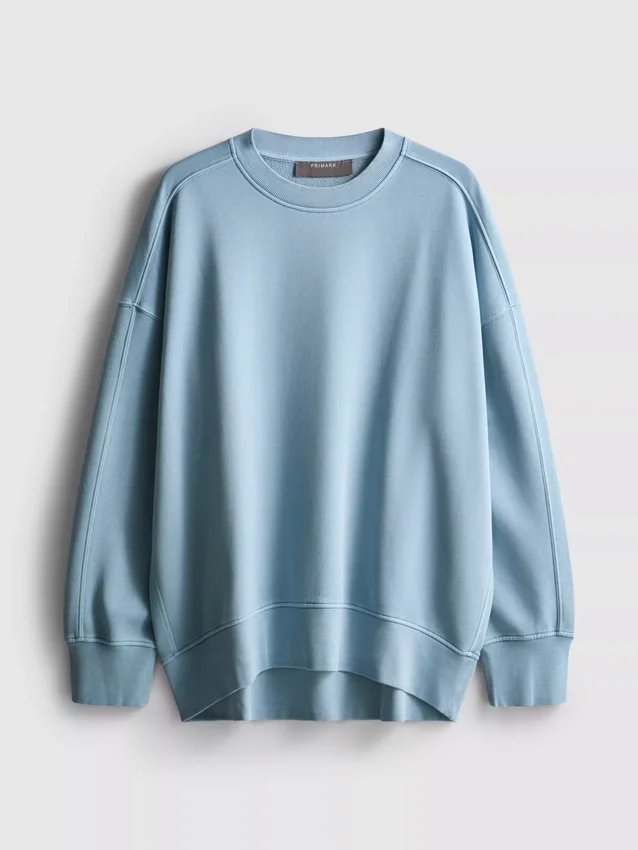Oversized-tröja med neddragna axlar
