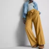Palazzobyxor med rosettdetalj