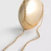 Paula Echevarría metallisk oval crossbody-väska