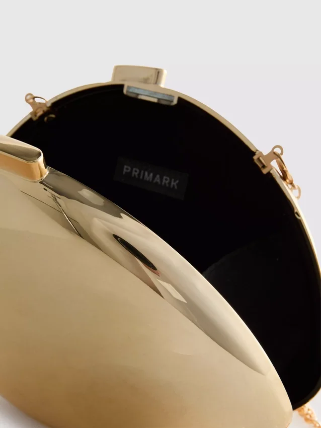Paula Echevarría metallisk oval crossbody-väska
