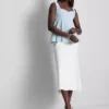 Peplum-top i crepe med hjärtformad halsringning