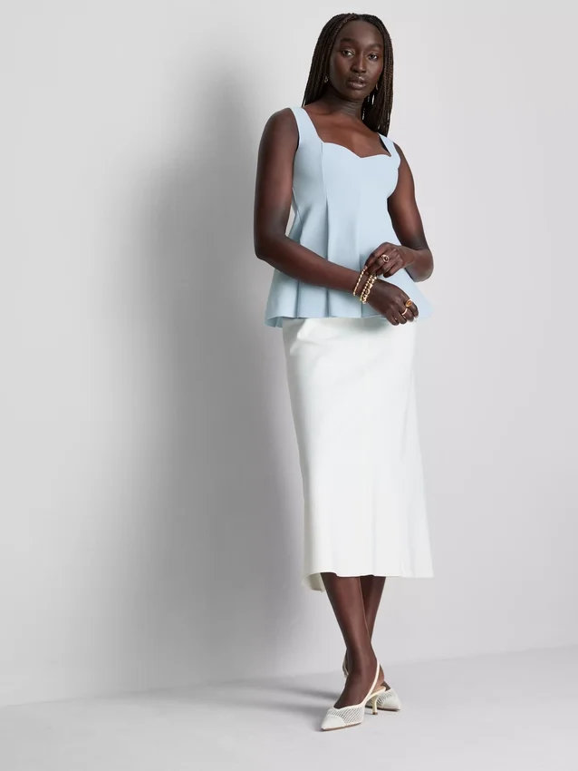 Peplum-top i crepe med hjärtformad halsringning