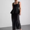Peplum-top i crepe med hjärtformad halsringning