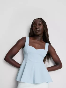 Peplum-top i crepe med hjärtformad halsringning