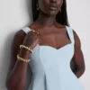 Peplum-top i crepe med hjärtformad halsringning
