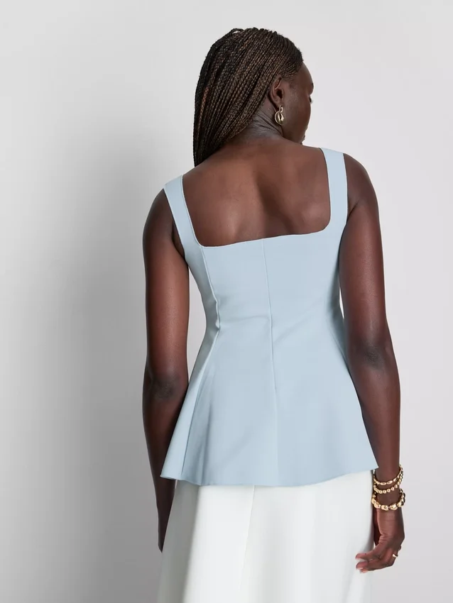 Peplum-top i crepe med hjärtformad halsringning