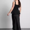 Peplum-top i crepe med hjärtformad halsringning