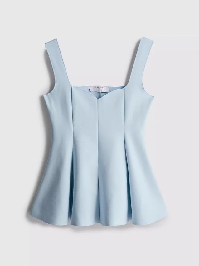 Peplum-top i crepe med hjärtformad halsringning