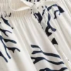 Pyjamasbyxor med vid ben och korallmönster