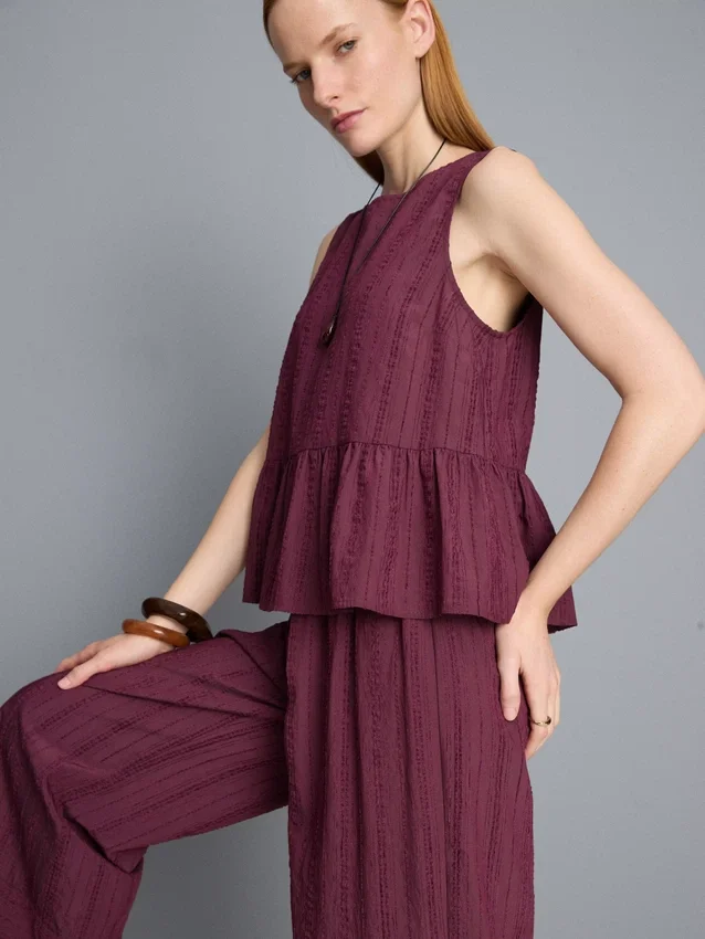 Randig linne med peplum-kant