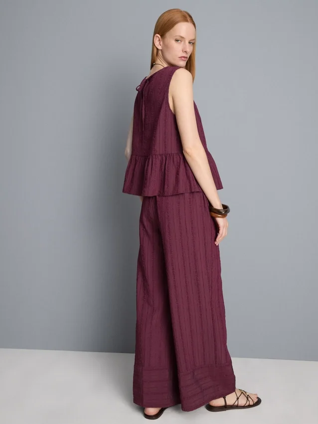 Randig linne med peplum-kant