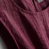 Randig linne med peplum-kant