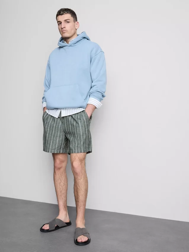 Randiga shorts i linneblandning