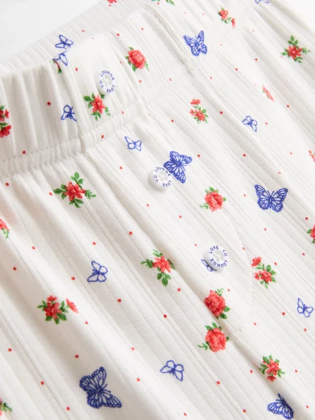 Ribbade pyjamasbyxor med fjärilsmönster