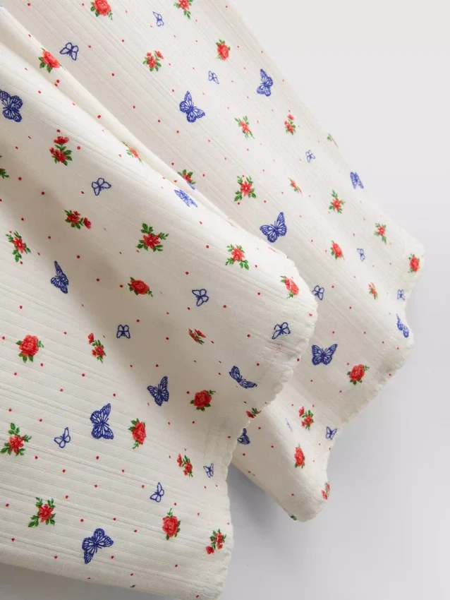 Ribbade pyjamasbyxor med fjärilsmönster