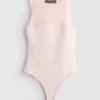 Ärmlös bodysuit med nätinsats