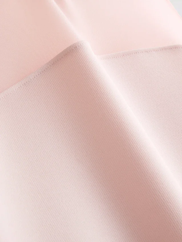 Ärmlös bodysuit med nätinsats