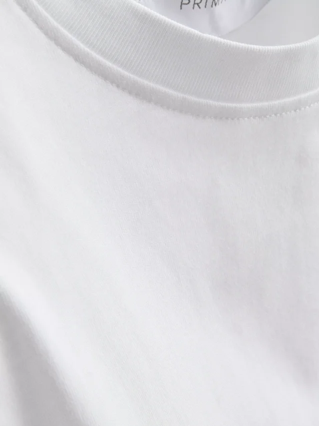Ärmlös T-shirt med vadderade axlar