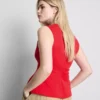 Ärmlös topp med V-ringning och peplum