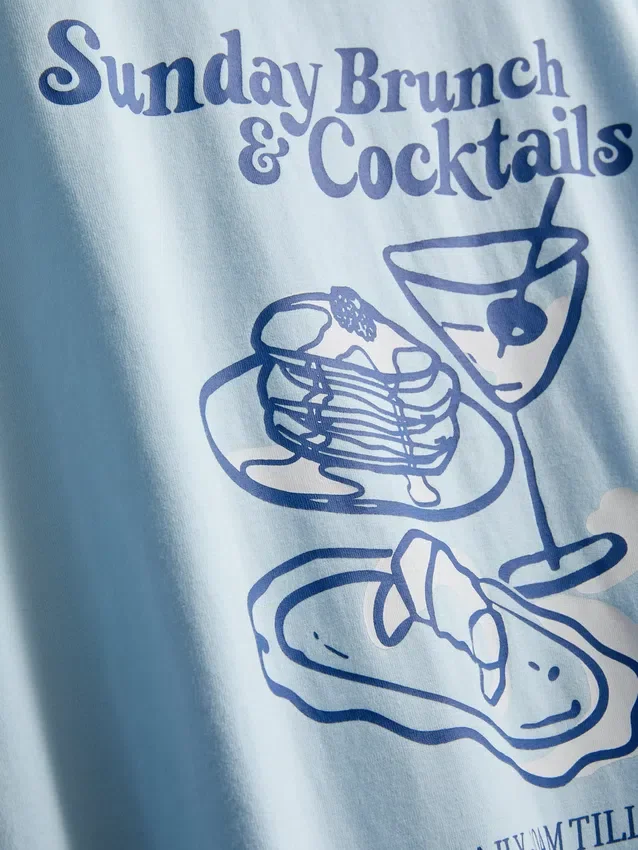 Rät skuren T-shirt i bomull med tryck