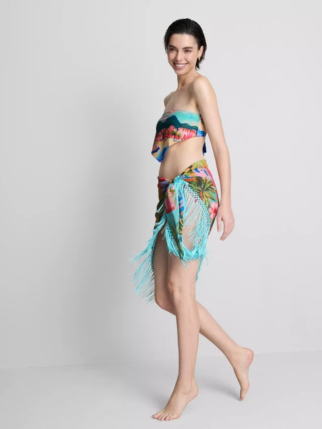 Sarong med fransar och tropiskt mönster