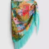 Sarong med fransar och tropiskt mönster