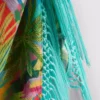 Sarong med fransar och tropiskt mönster