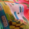 Sarong med fransar och tropiskt mönster