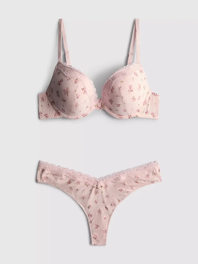 Set med tryckt push-up-bh och stringtrosa