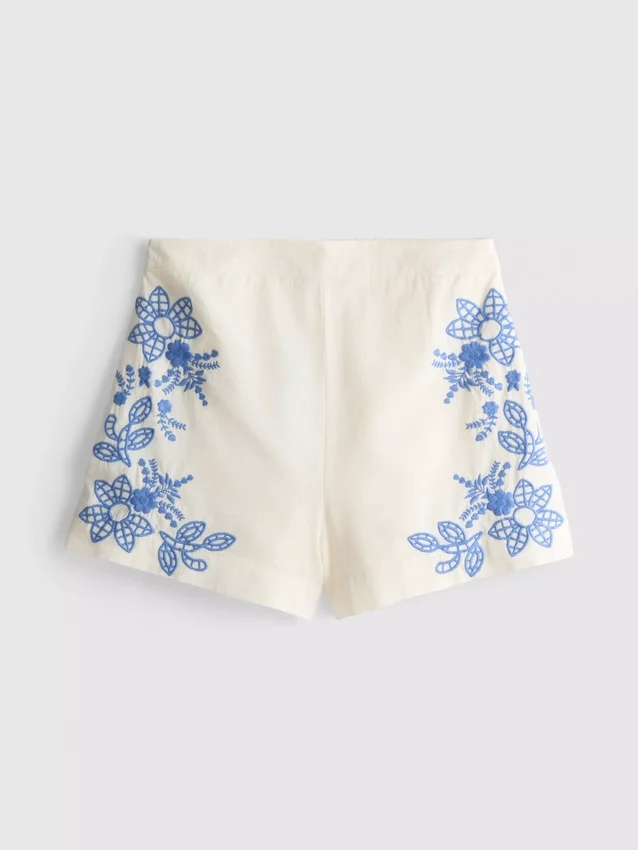 Shorts i bomull med blommig brodyr