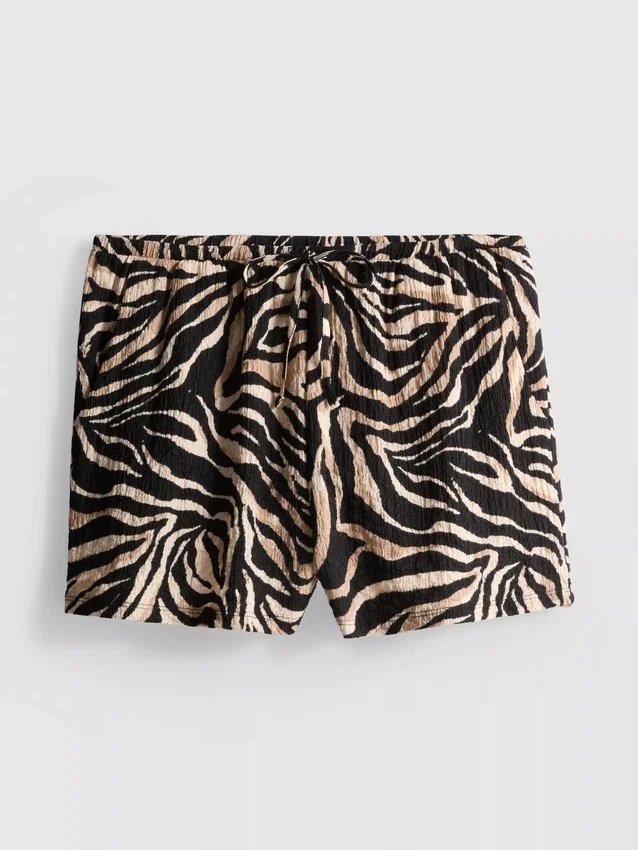Shorts med tryck och skrynklig struktur