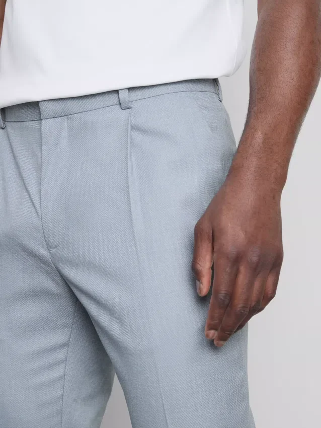 Slim fit-byxor i dobby-struktur