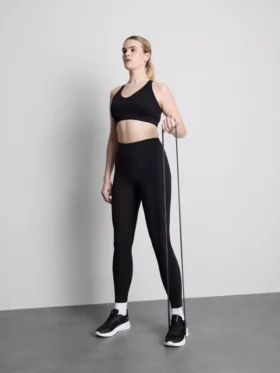 Sömlös aktiv crop-top med korsad rygg