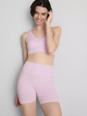 Sömlös aktiv crop-top med korsad rygg