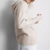 Stickad hoodie med dragsko