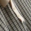 Stickad rutig polotröja