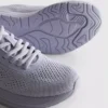 Stickade sneakers med snörning