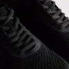Stickade sneakers med snörning