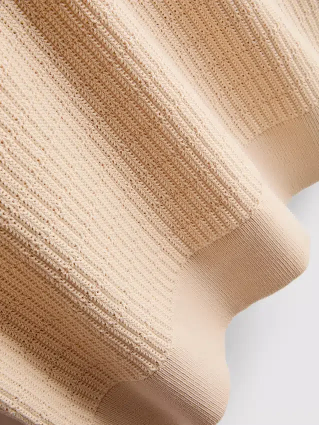 Strickad polotröja med struktur