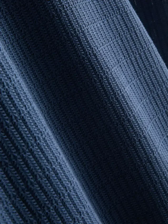 Strickad polotröja med struktur