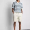 Strickad polotröja med strukturerade ränder