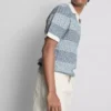 Strickad polotröja med strukturerade ränder